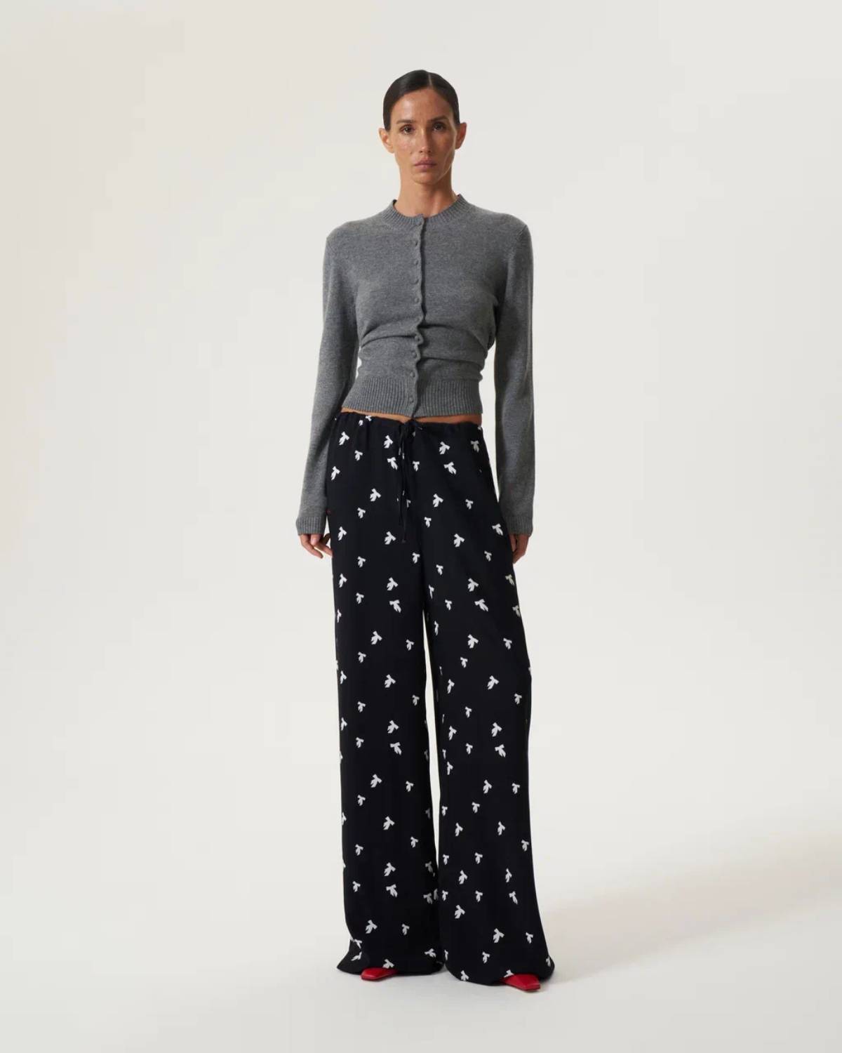 Drawstring trousers with bow print