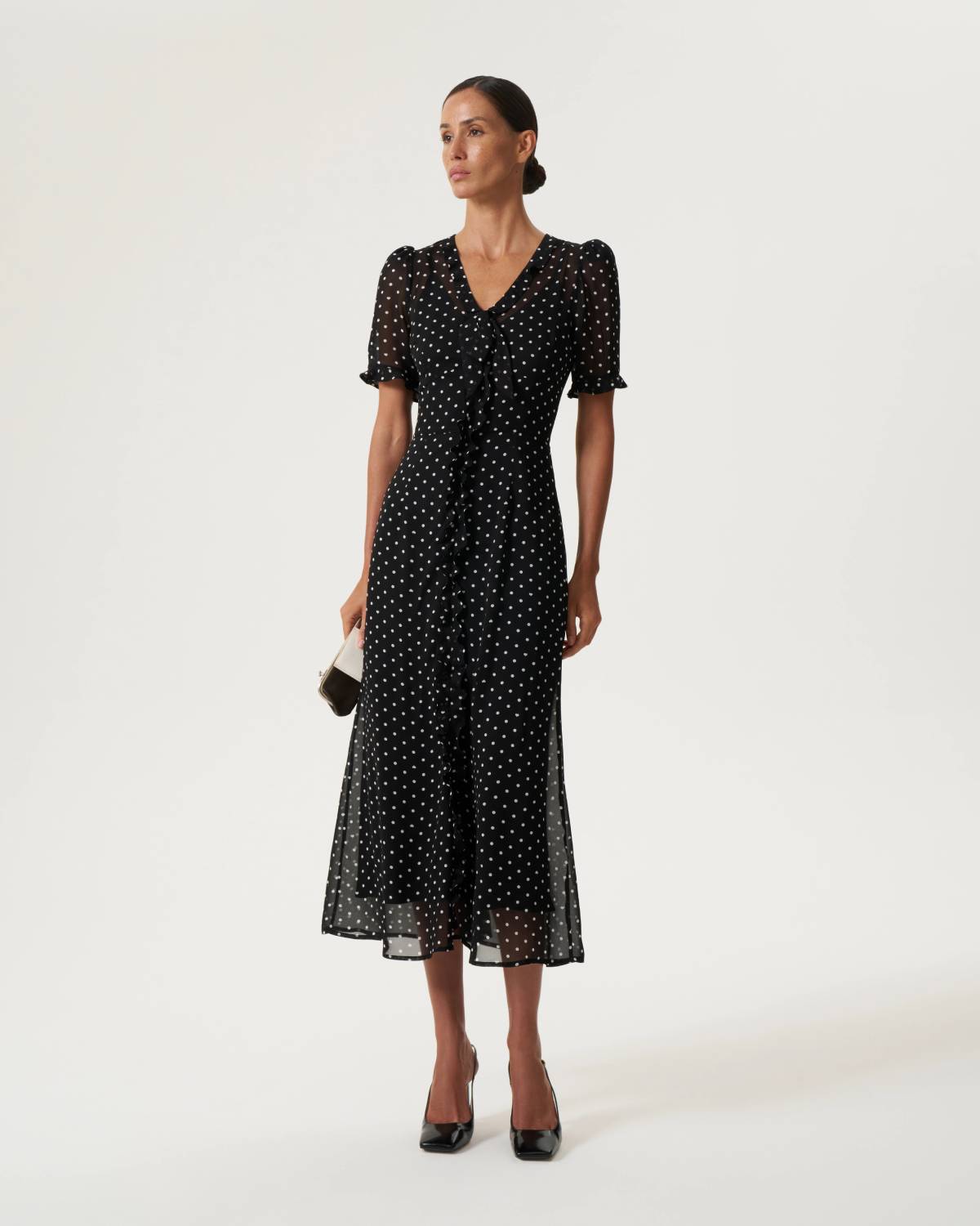 Polka dot black dress with bow